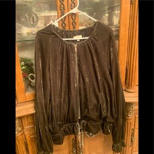 Olive colored velvet jacket. Never worn no tags. runs large.